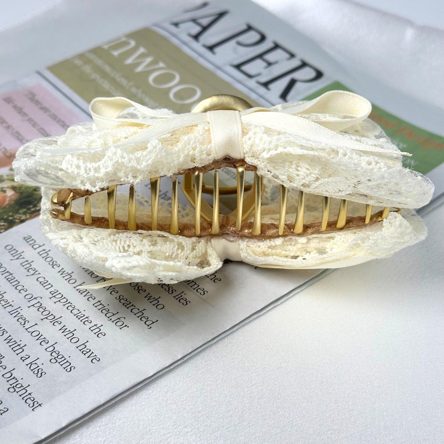 a fake tooth is on top of a newspaper