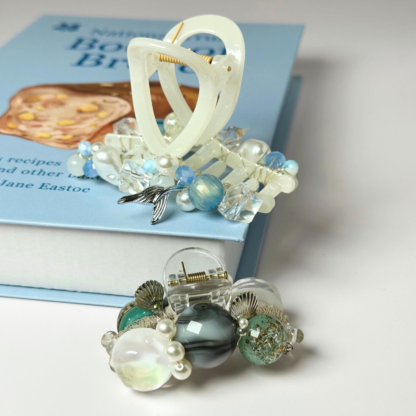 a book with a bunch of ornaments on top of it