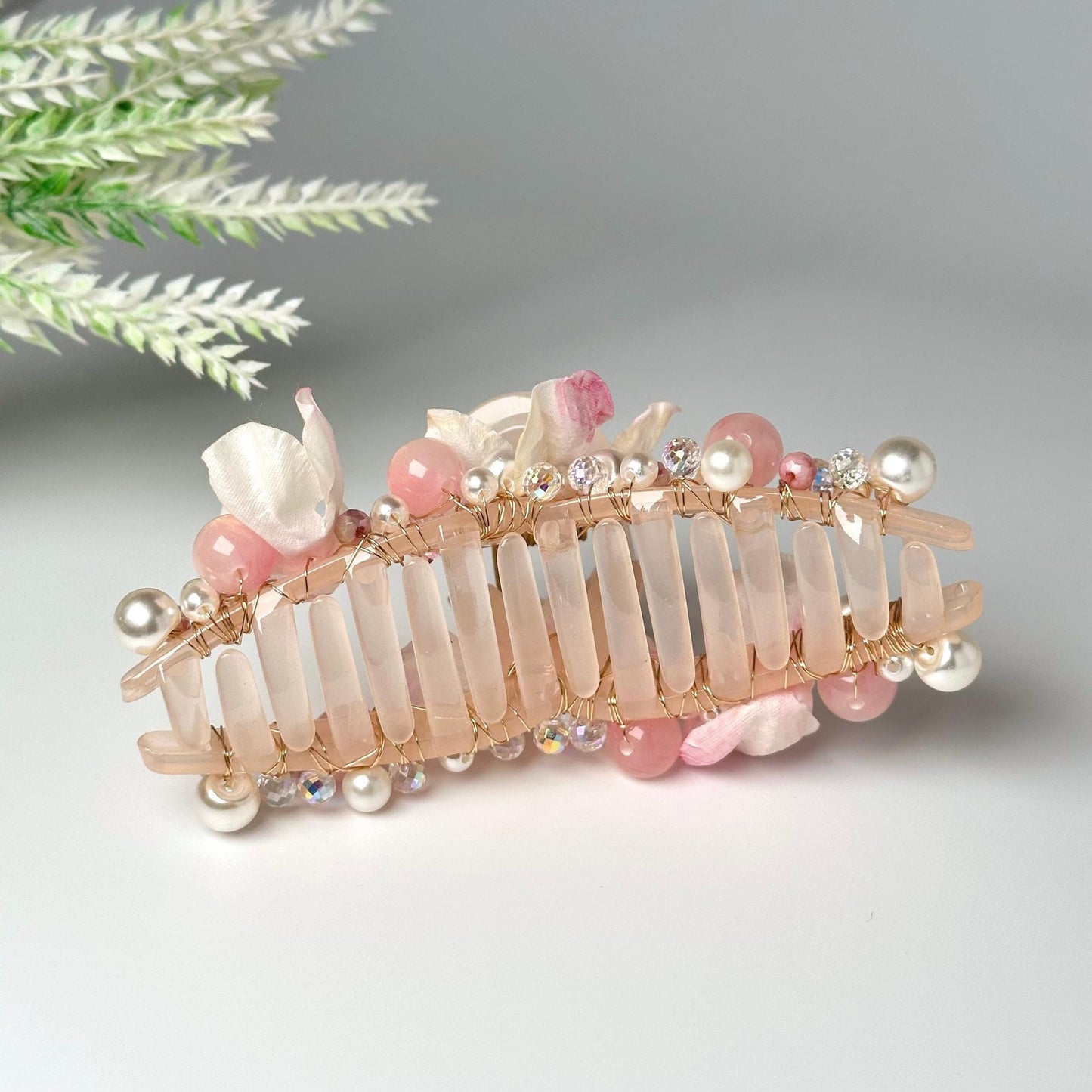 a close up of a hair comb on a table