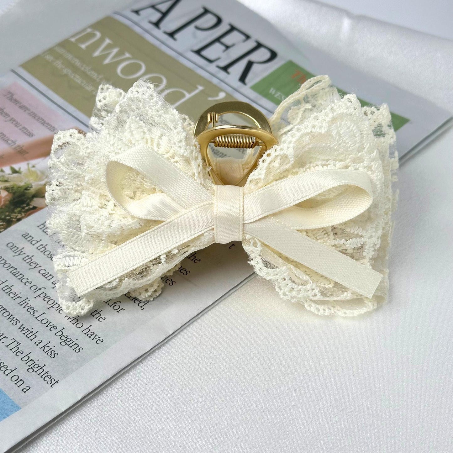a close up of a ring on top of a magazine
