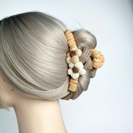 a close up of a woman's head with a hair clip