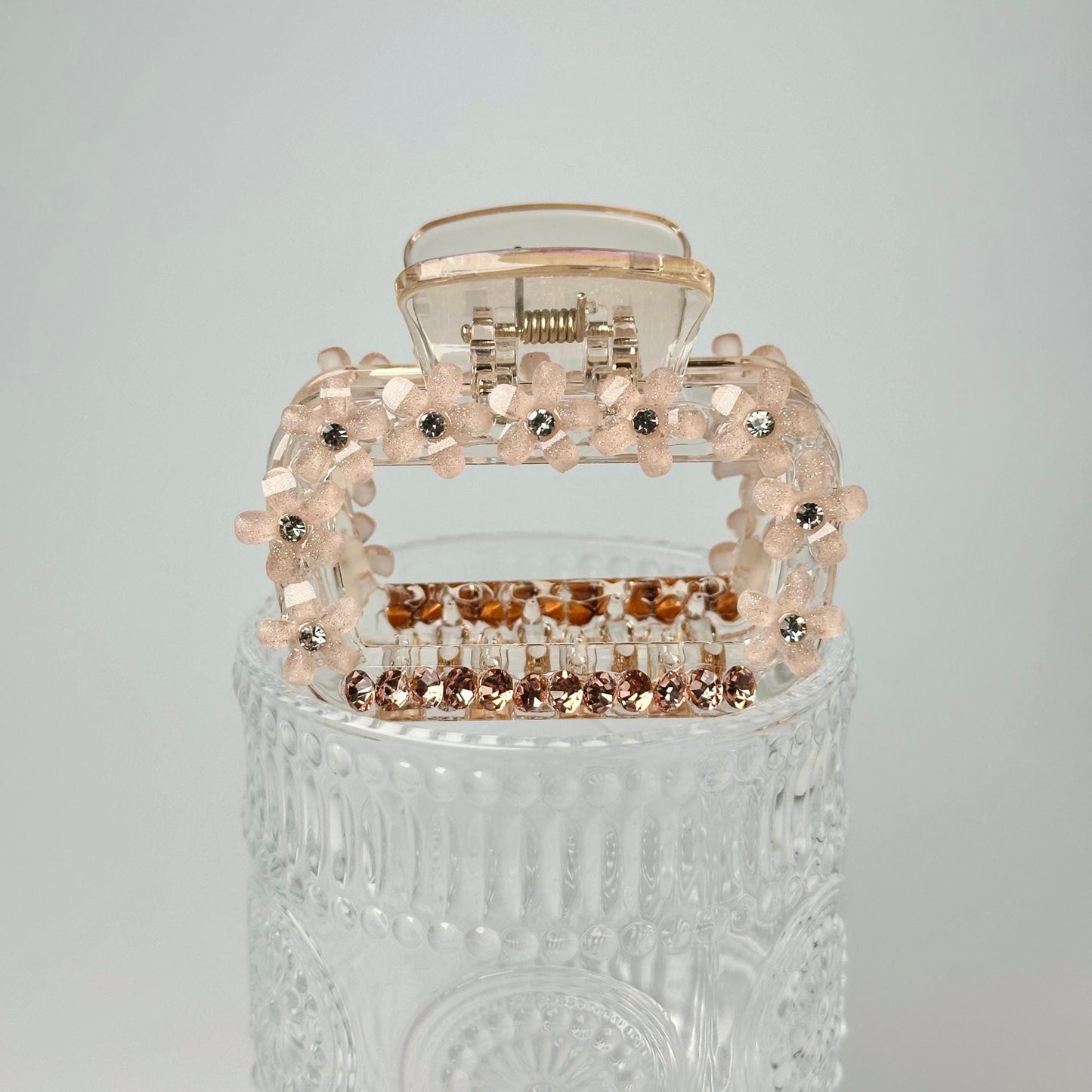 a clear case with a bunch of beads on it
