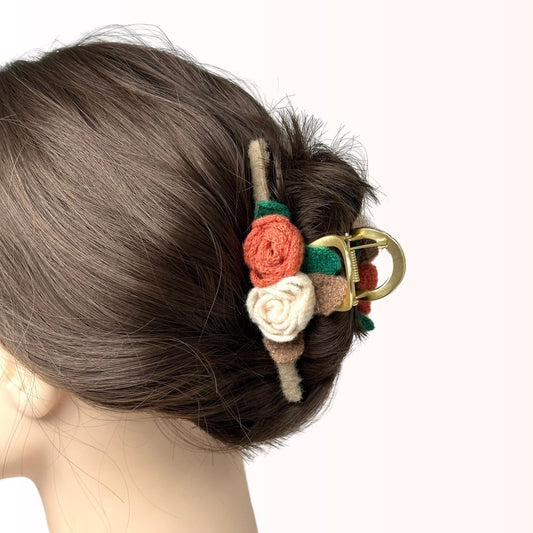 a close up of a woman's head with a hair clip