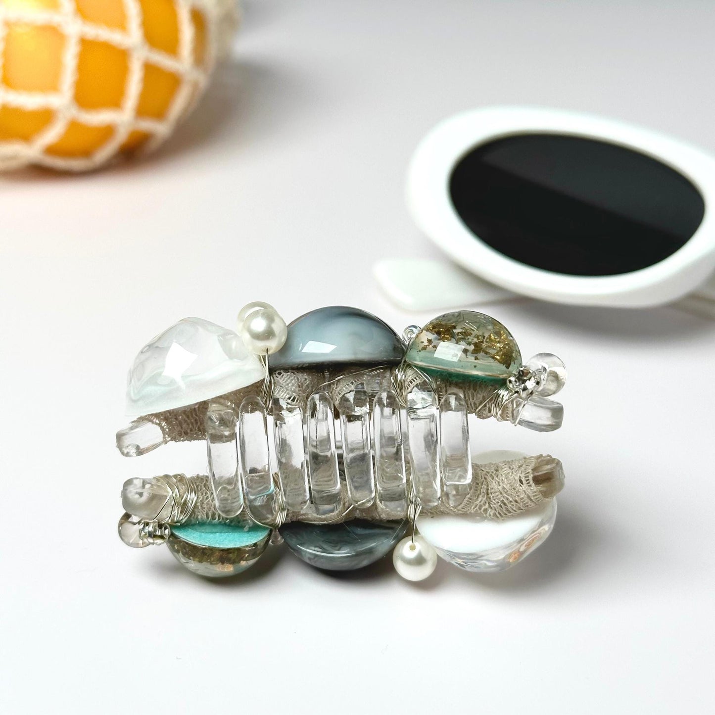 a close up of a bunch of beads on a table