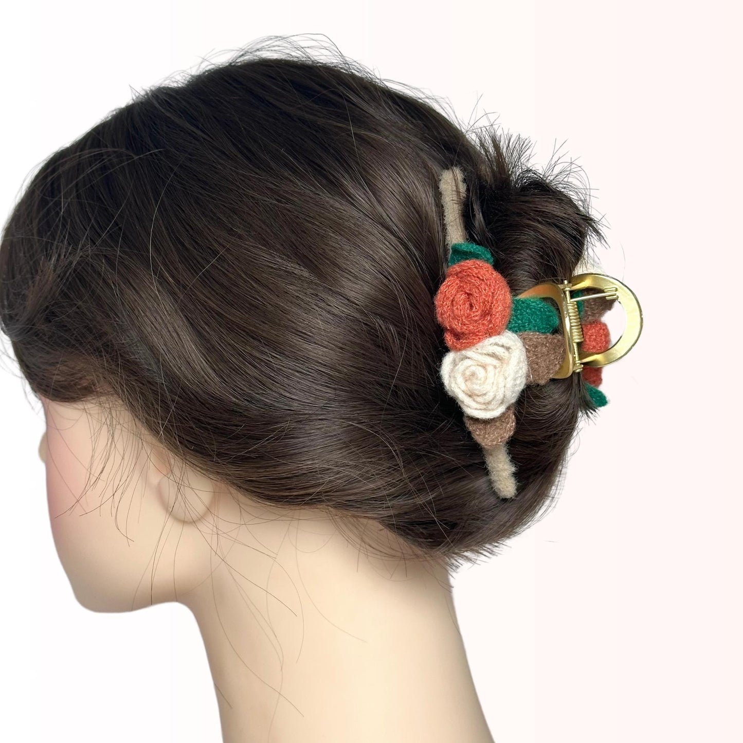a close up of a woman's head with a hair clip