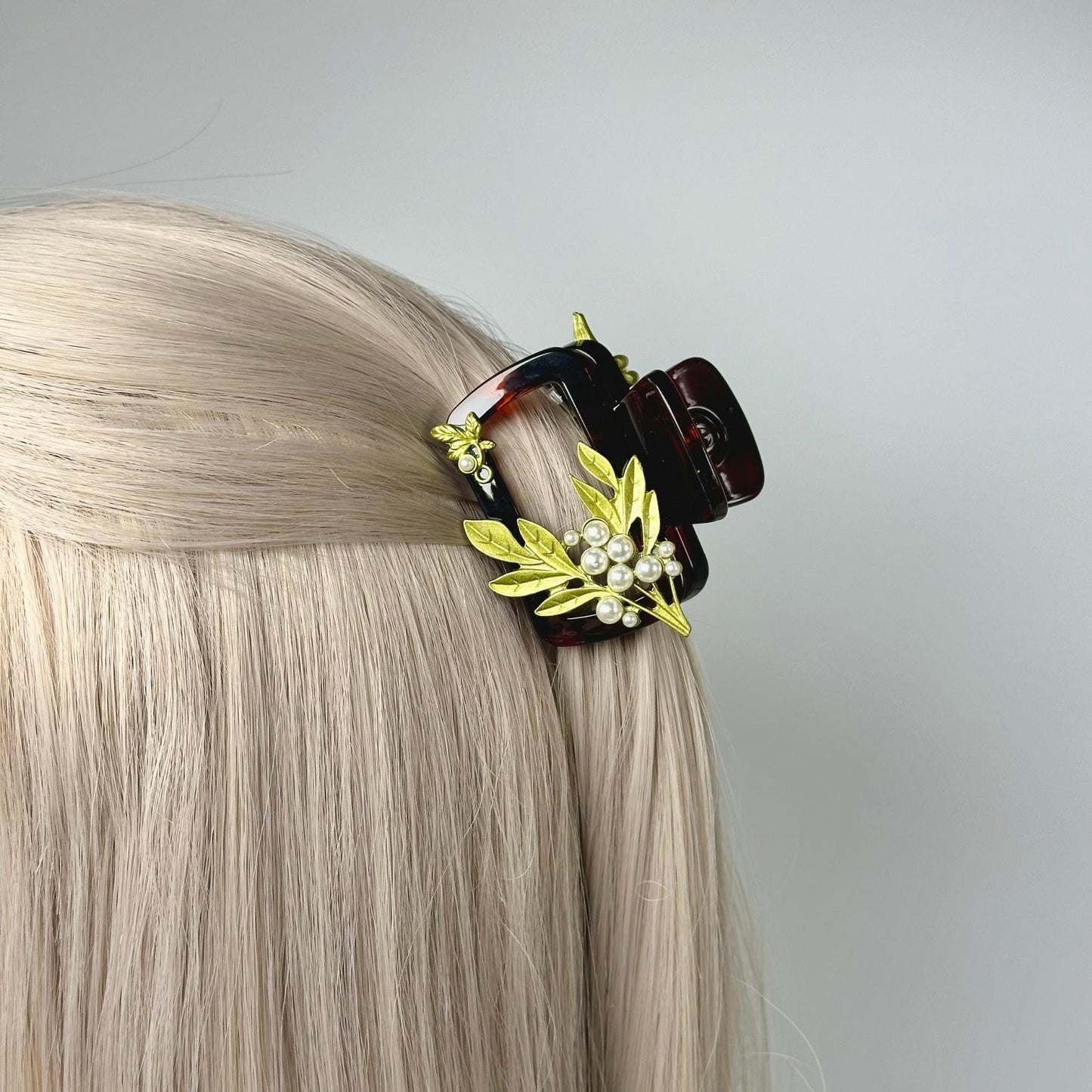 a blonde wig with a pair of sunglasses on top of it