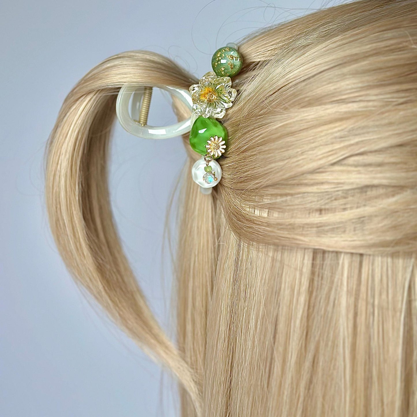 a close up of a woman's hair with a hair clip