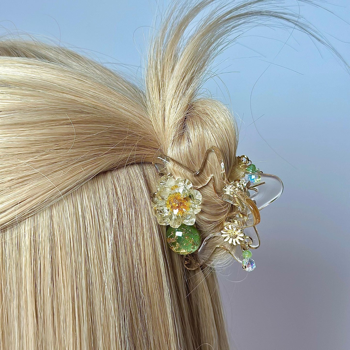 a close up of a woman's hair with a hair clip