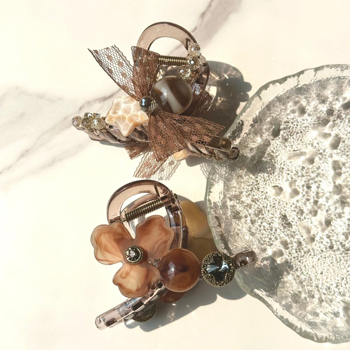 a close up of a glass plate with flowers on it