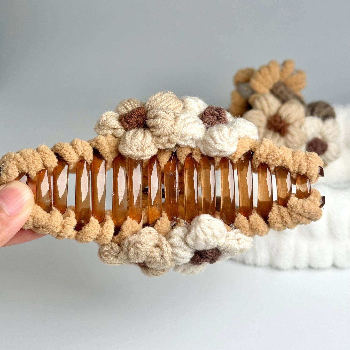 a person is holding a comb with honey combs on it