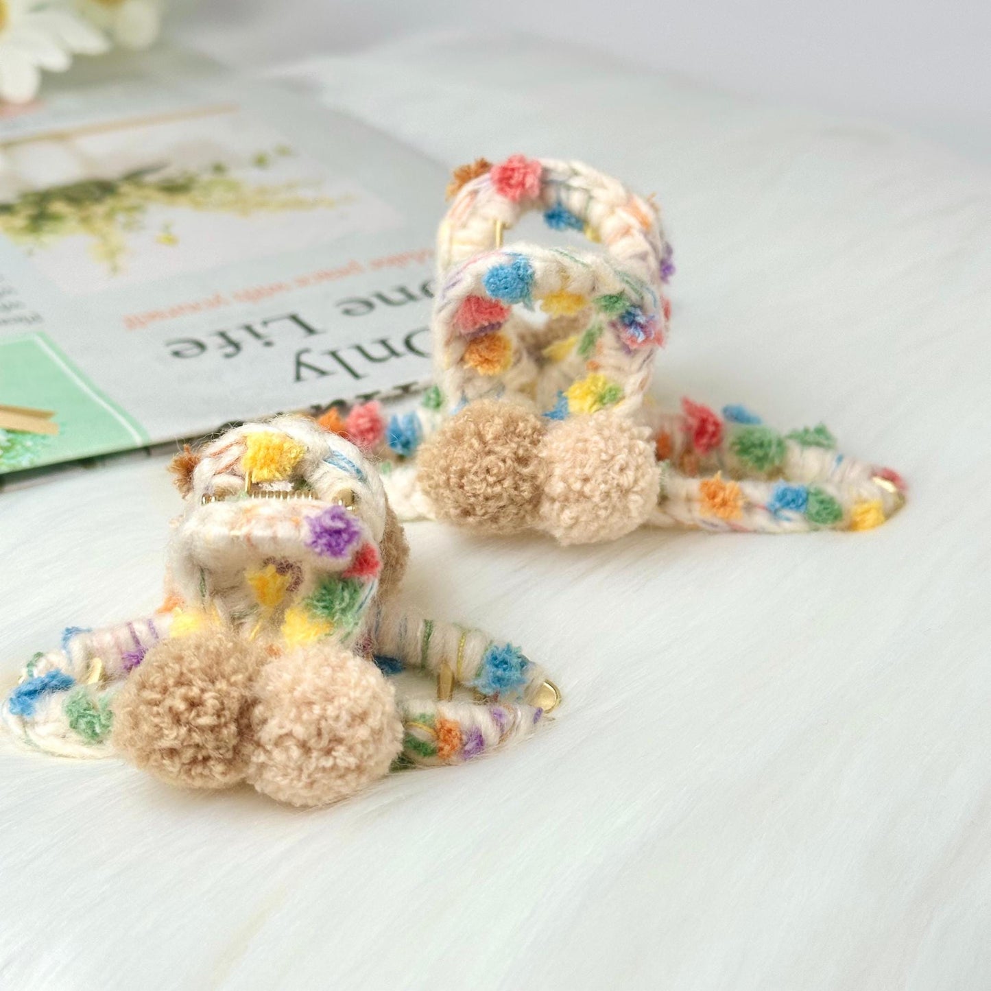 a pair of stuffed animals sitting on top of a table