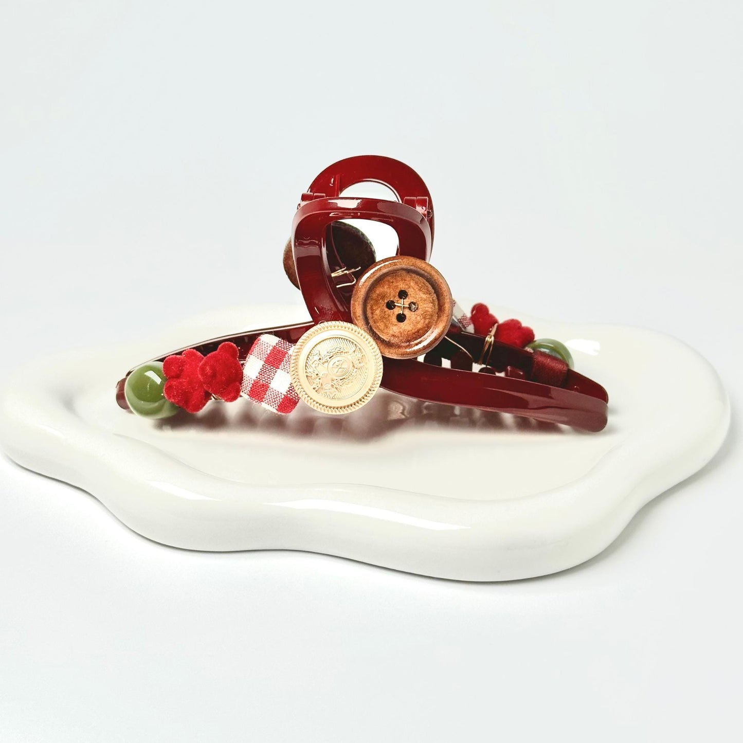 a white plate topped with a red and white object