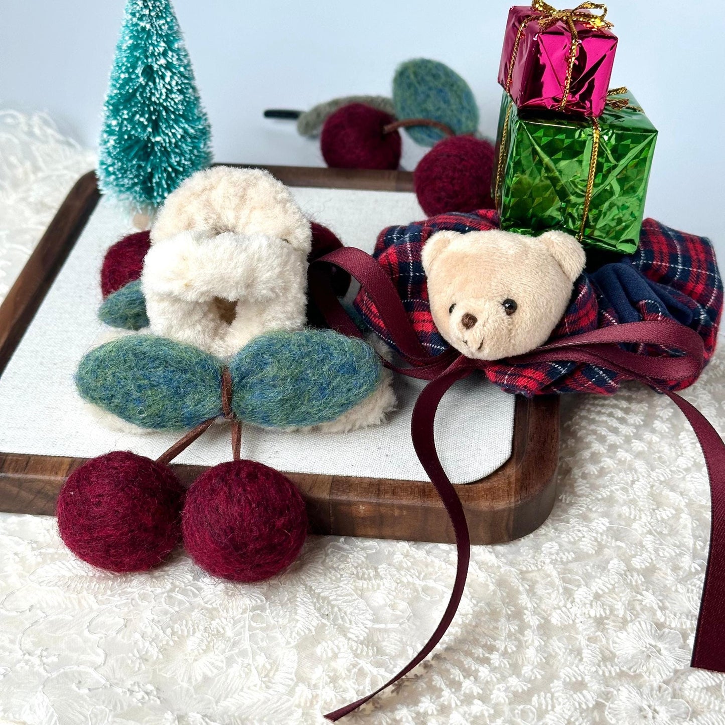 a teddy bear sitting on top of a table