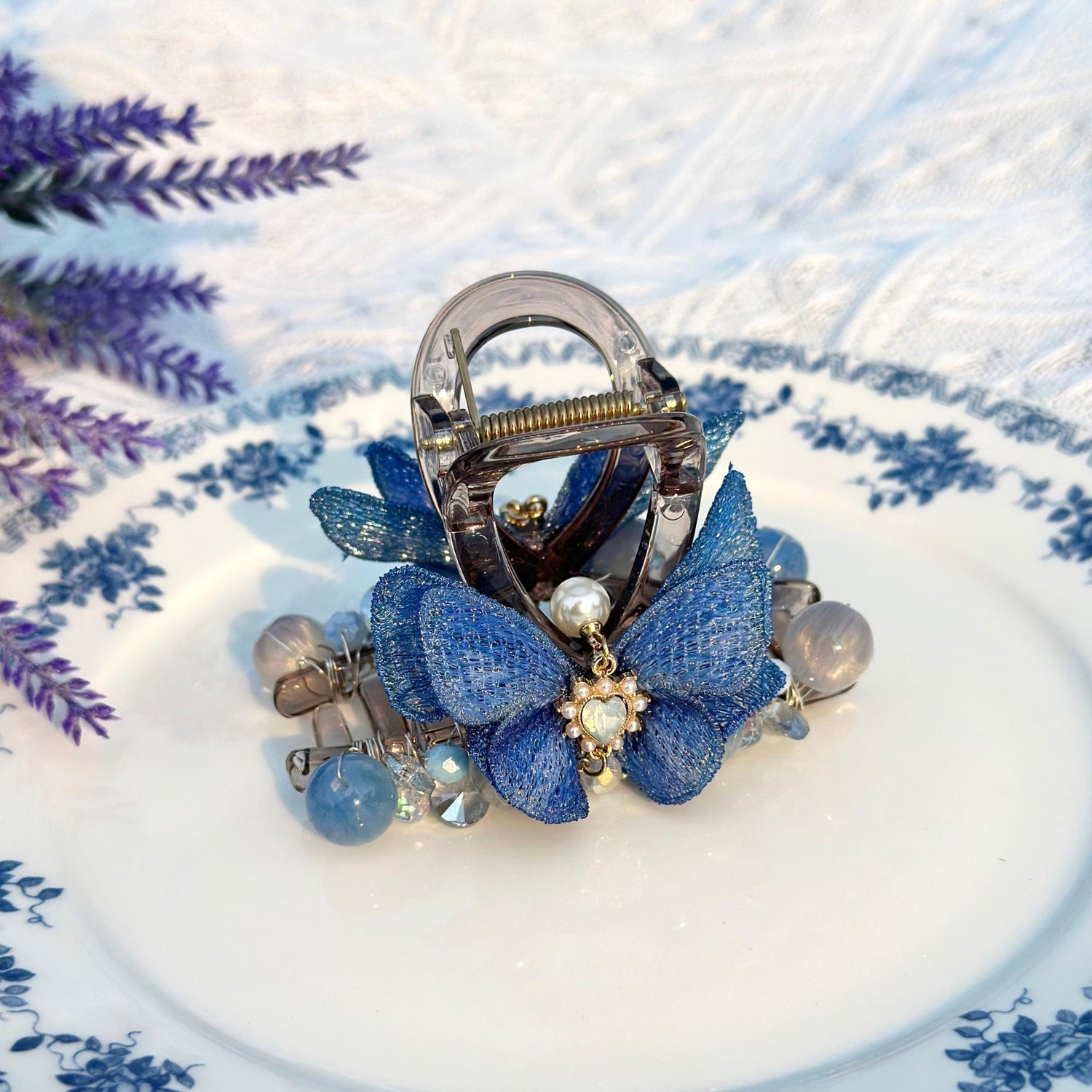 a blue and white plate with a purse on it