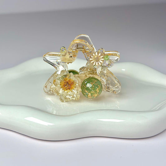 Large Daisy Floral Hair Claw Clip by Ms. Pepper&#39;s Closet. Perfect for thick hair, this large floral design securely holds hair in place. Ideal for those seeking stylish cute claw clips.