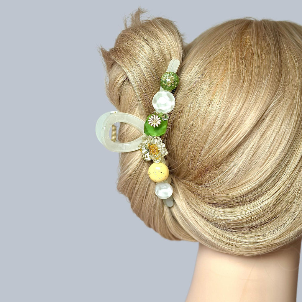 Large Daisy Floral Hair Claw Clip by Ms. Pepper's Closet. Perfect for thick hair, this large floral design securely holds hair in place. Ideal for those seeking stylish cute claw clips.