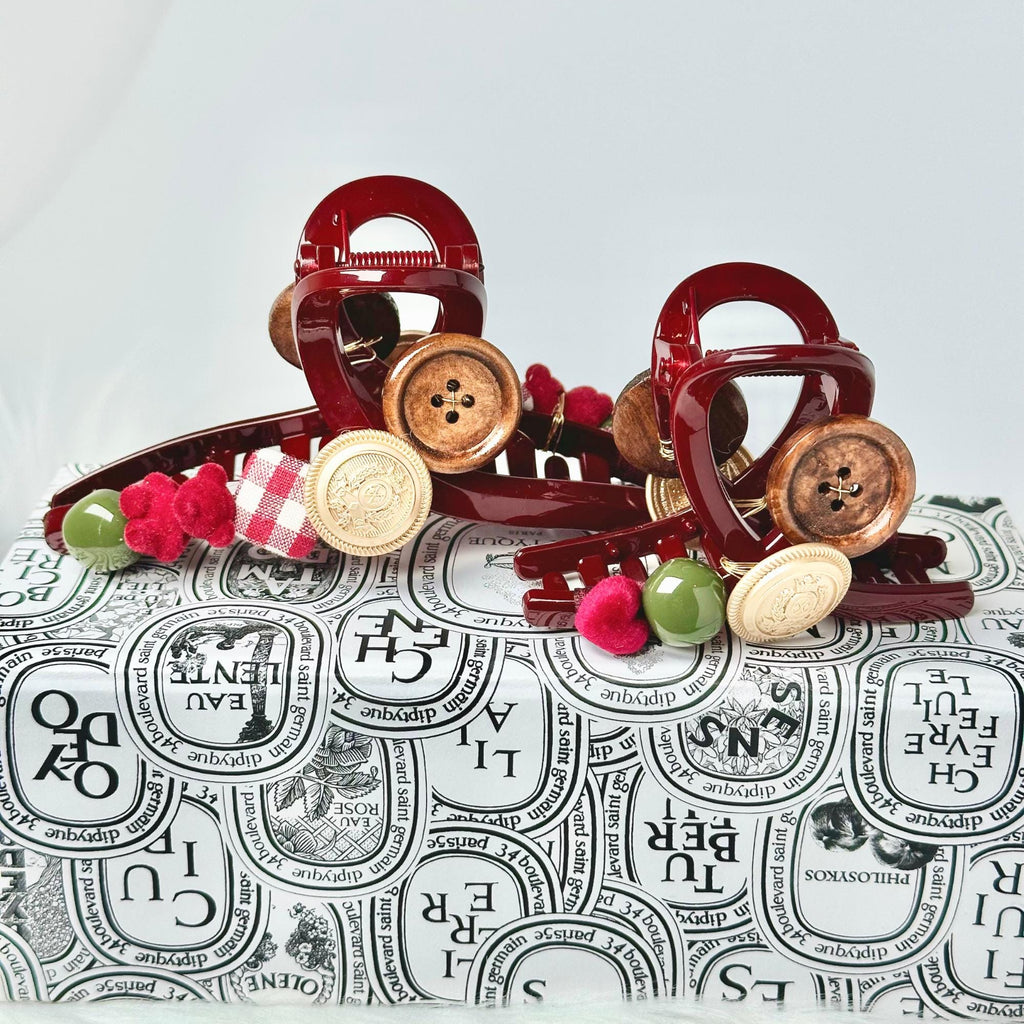 a close up of a purse with buttons on it