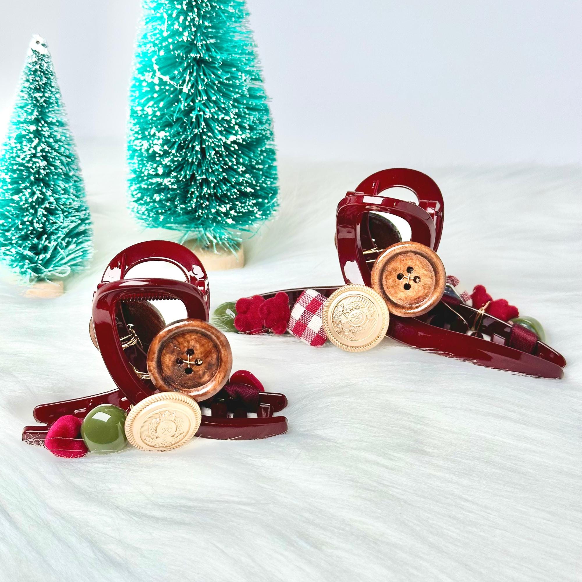 a couple of wooden buttons sitting on top of a snow covered ground