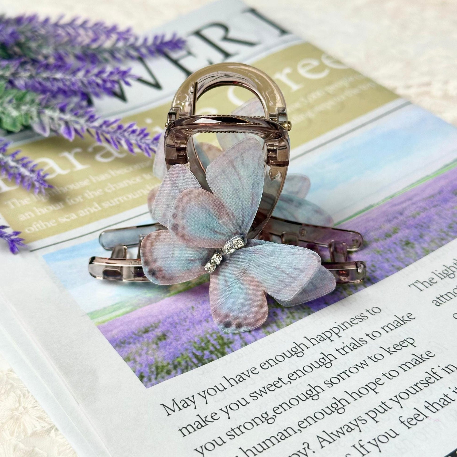a brooch sitting on top of a magazine