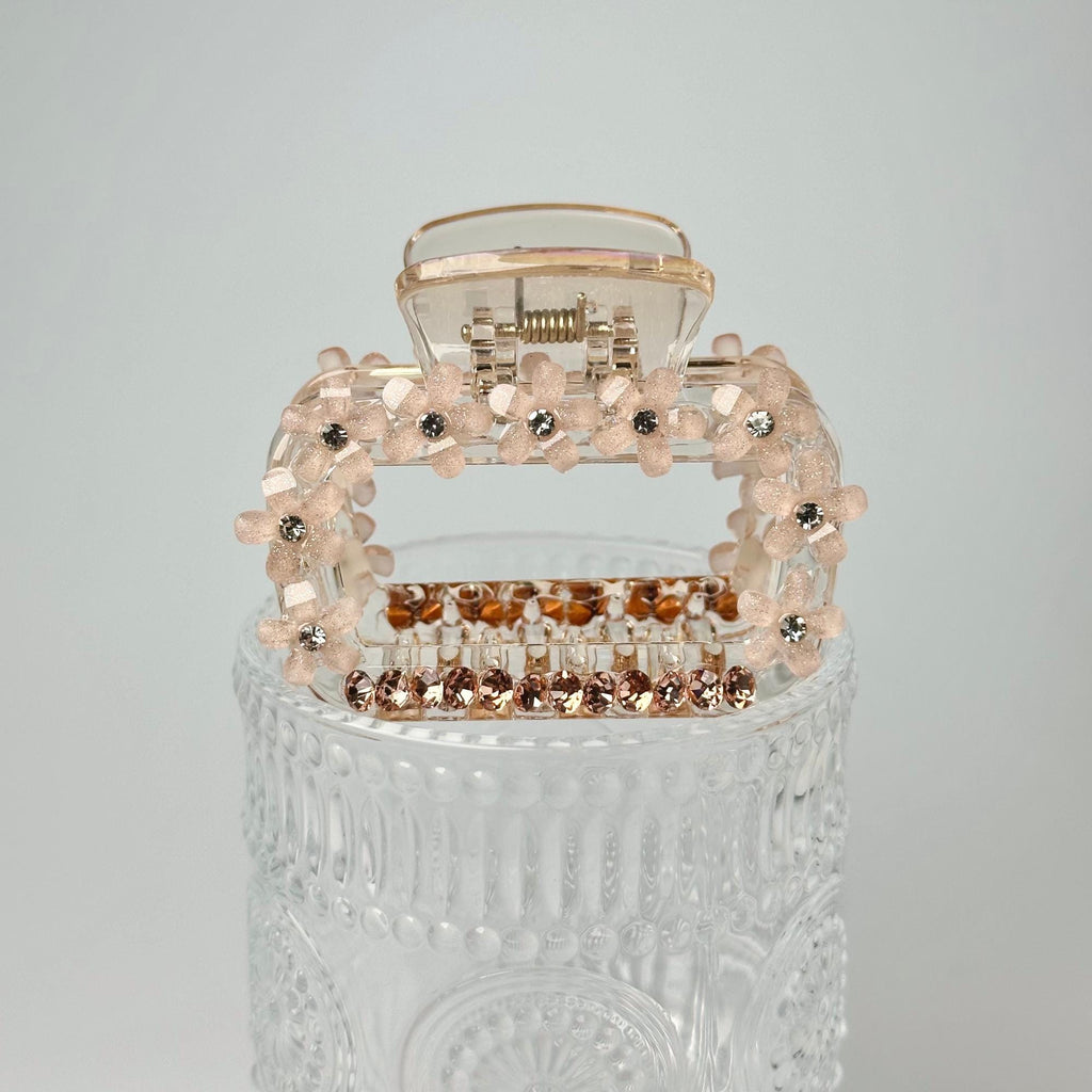 a clear case with a bunch of beads on it