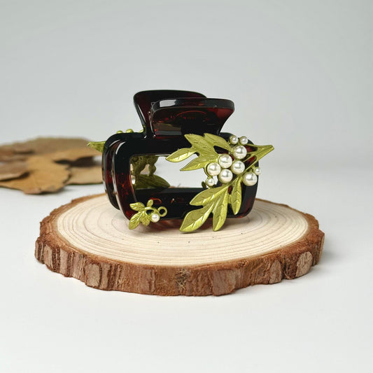 a pair of sunglasses sitting on top of a piece of wood