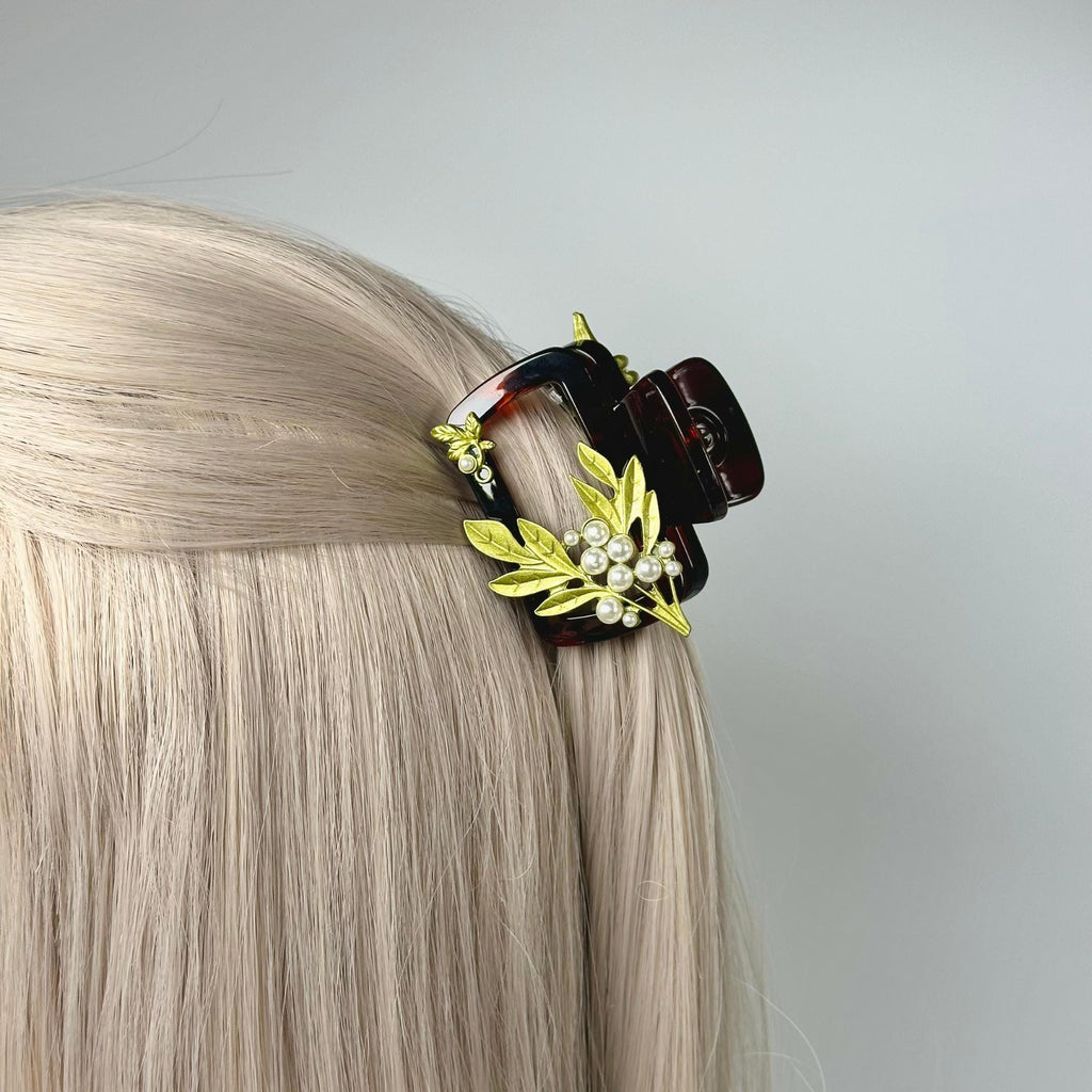 a blonde wig with a pair of sunglasses on top of it