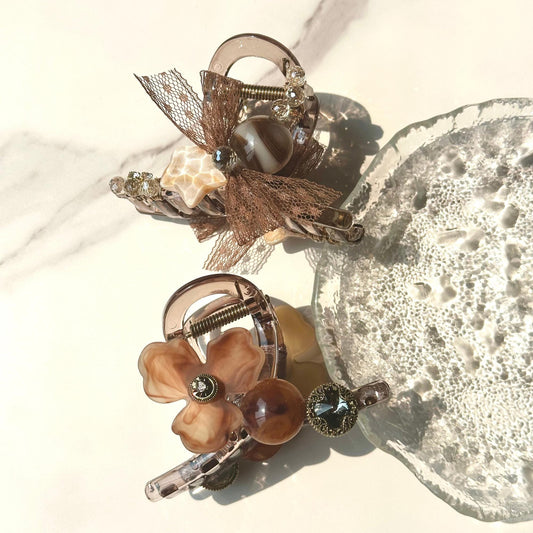 a close up of a glass plate with flowers on it