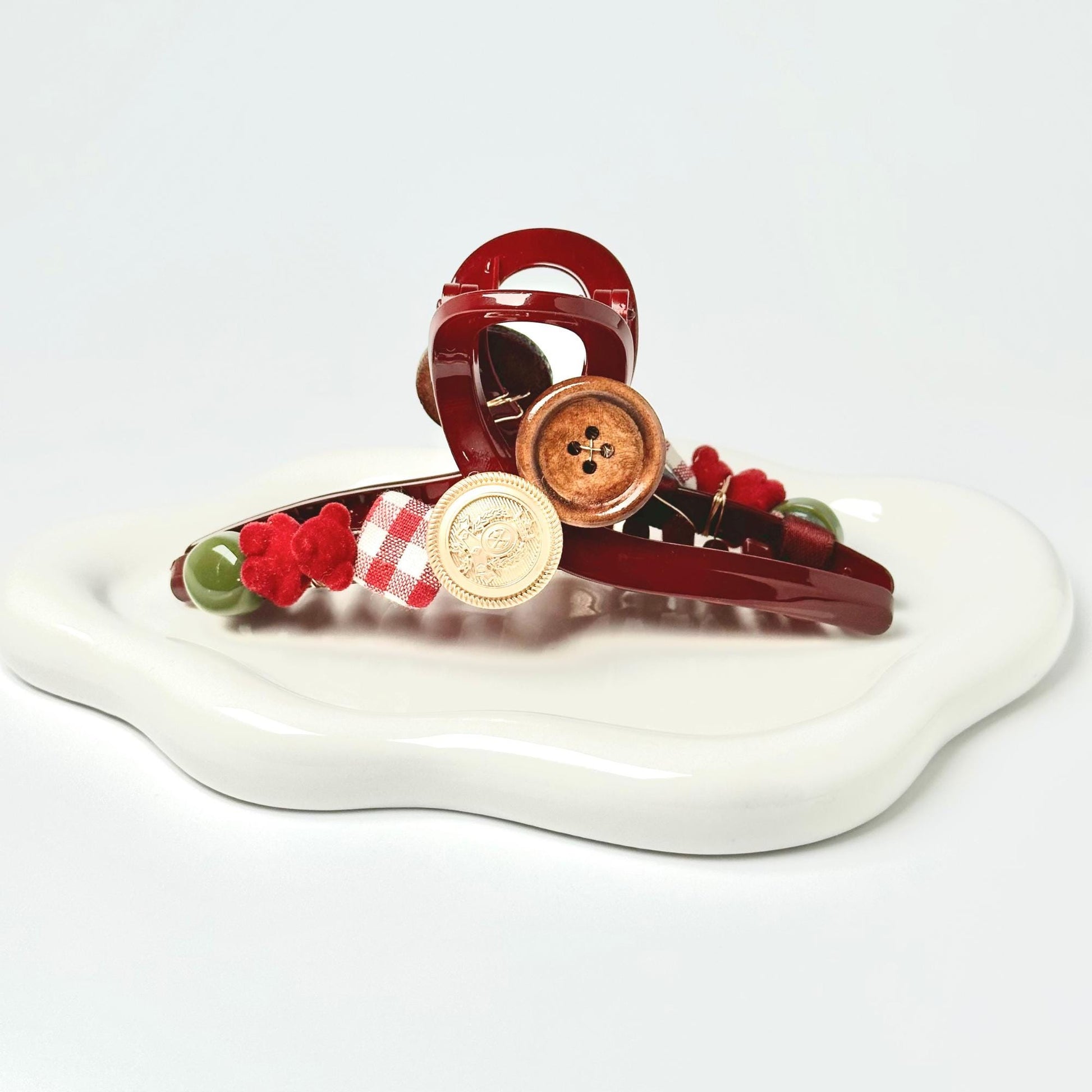 a white plate topped with a red and white object