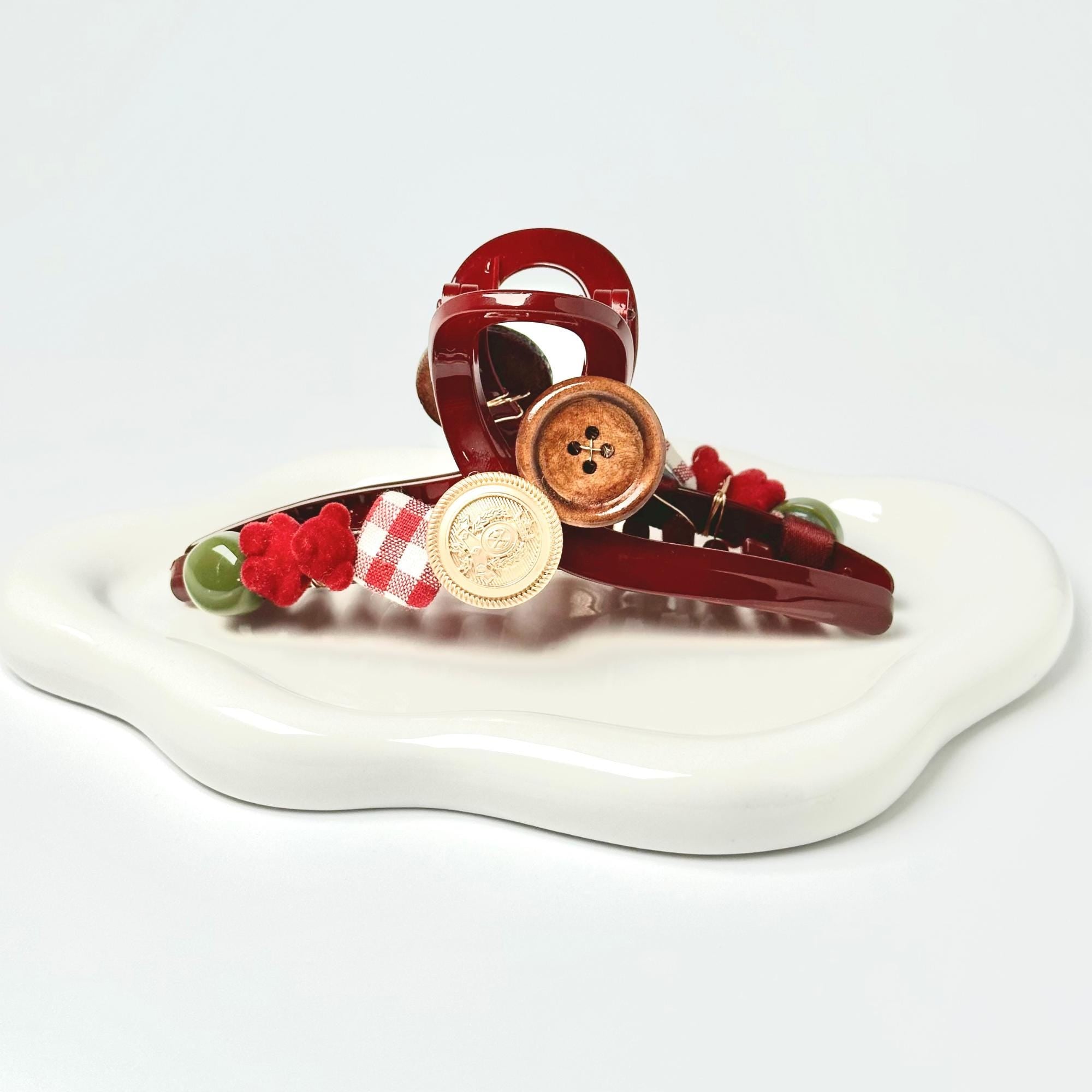 a white plate topped with a red and white object